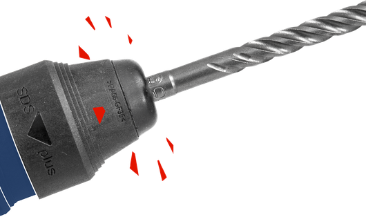 旋轉鎚鑽頭安裝在卡盤上，用於重型鑽孔任務。.