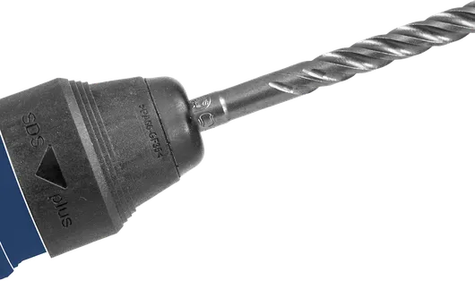 卡盤中裝有螺旋鑽頭的旋轉錘鑽。.