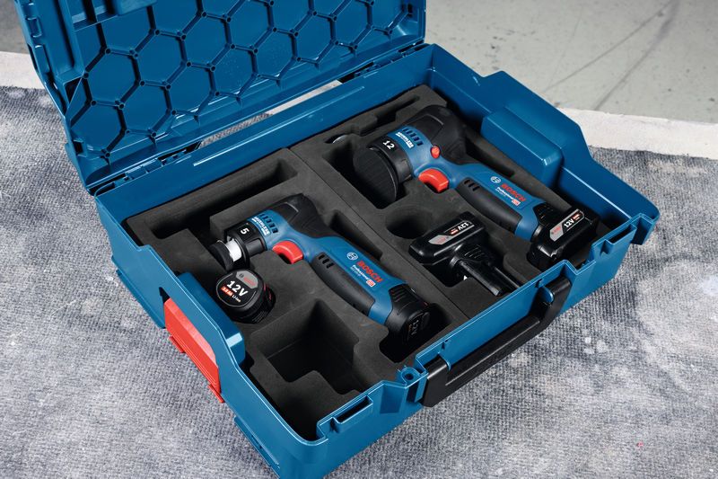 GPX 12V-77 藍色手提箱,內有拋光機和兩個用泡沫固定的 12V 無線電動工具。.